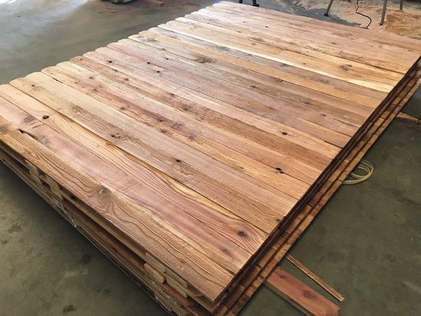 Stack of 1x4x6 cedar fence panels for sale
