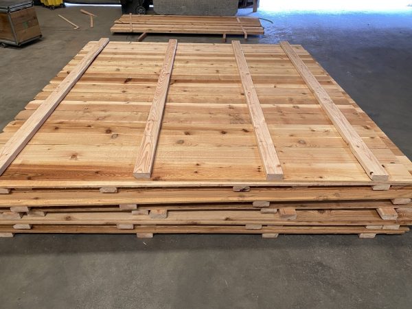 Stacked 8' cedar fence panels for sale in OKC.